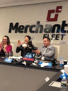 Brendan P. Keegan with a Money Gun During a Presentation