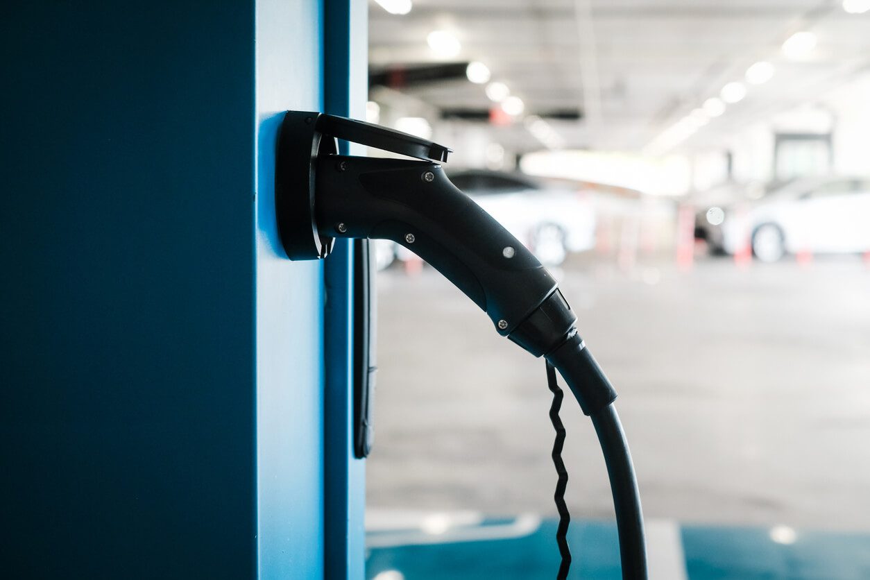 close up image of a blue electric car charging station