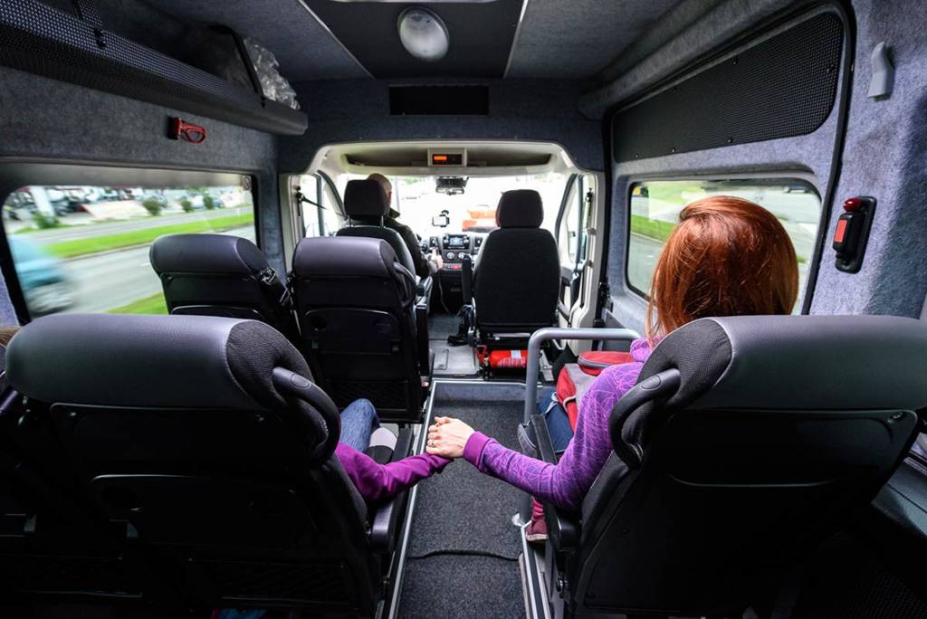 child-and-mom-in-transport-van