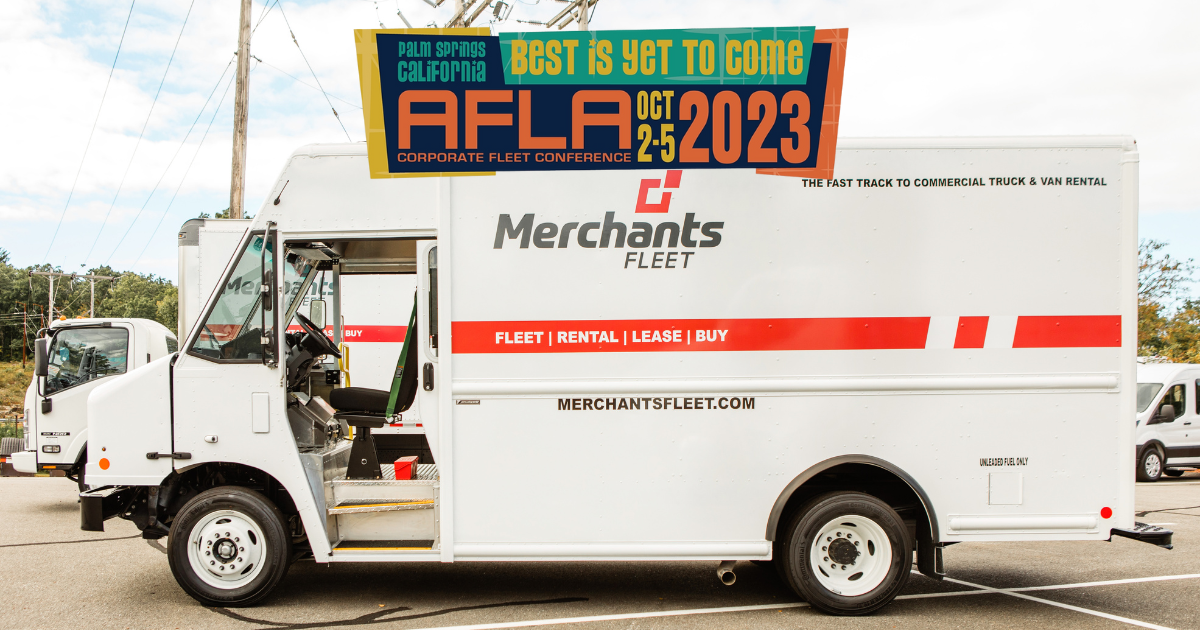 A white delivery truck with "Merchants Fleet" branding, advertising a 2023 fleet conference in Palm Springs.