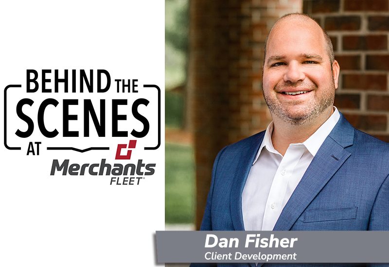 Man in a suit smiling next to text reading "Behind the Scenes at Merchants Fleet" and "Dan Fisher, Client Development".