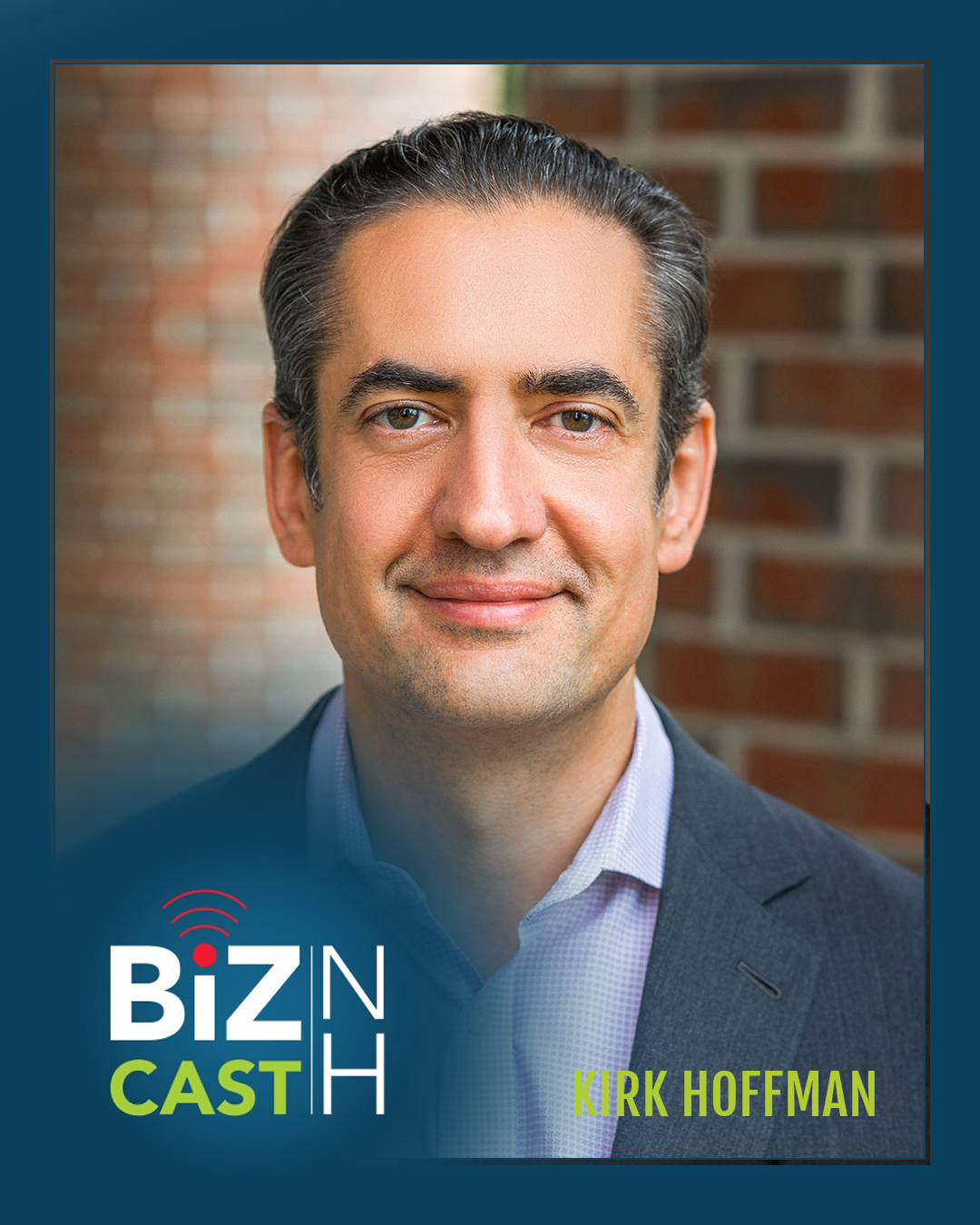 Man in a suit smiling with "BizNHcast" and "Kirk Hoffman" written in the frame. Brick background.