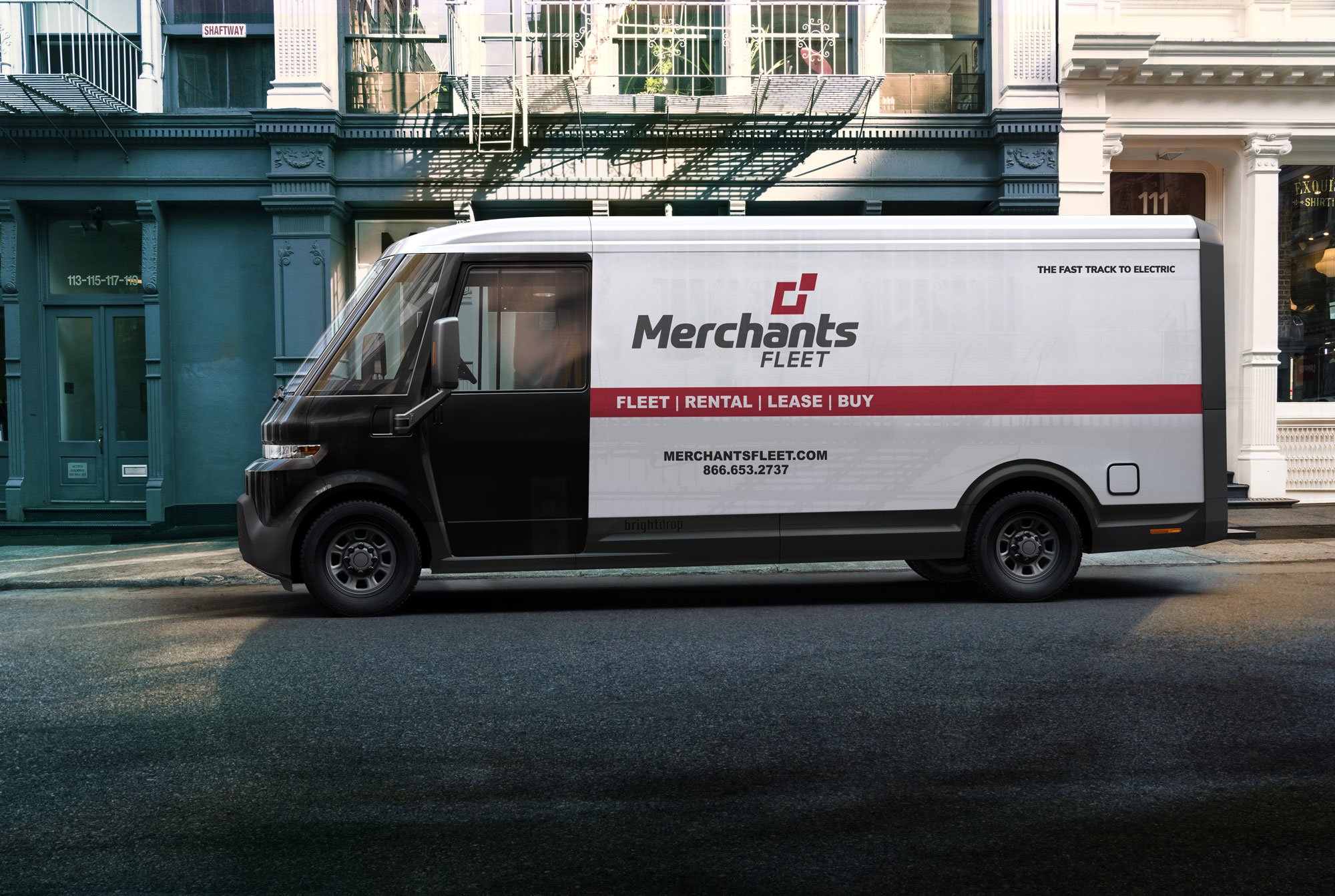Electric delivery van parked on a city street, branded with "Merchants Fleet" and rental service details.