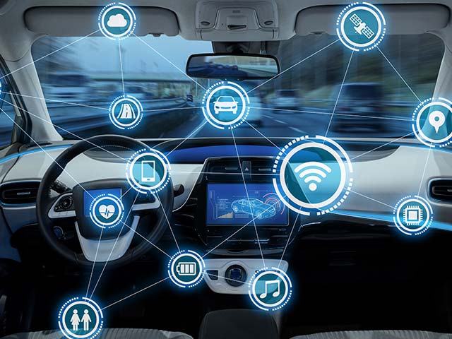Futuristic car interior with digital icons overlay representing connectivity and smart technology features.