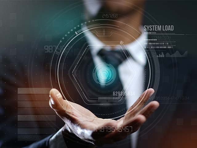 A person in a suit holds a holographic digital interface displaying circular graphics and data points.