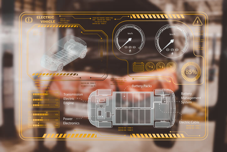 Futuristic digital display showing electric vehicle battery stats and system diagnostics overlay on a car.