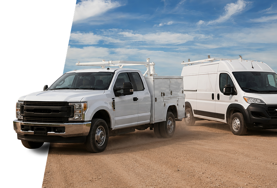 White utility service truck and white cargo van with ladder racks parked on a dirt road under a blue sky with scattered clouds.